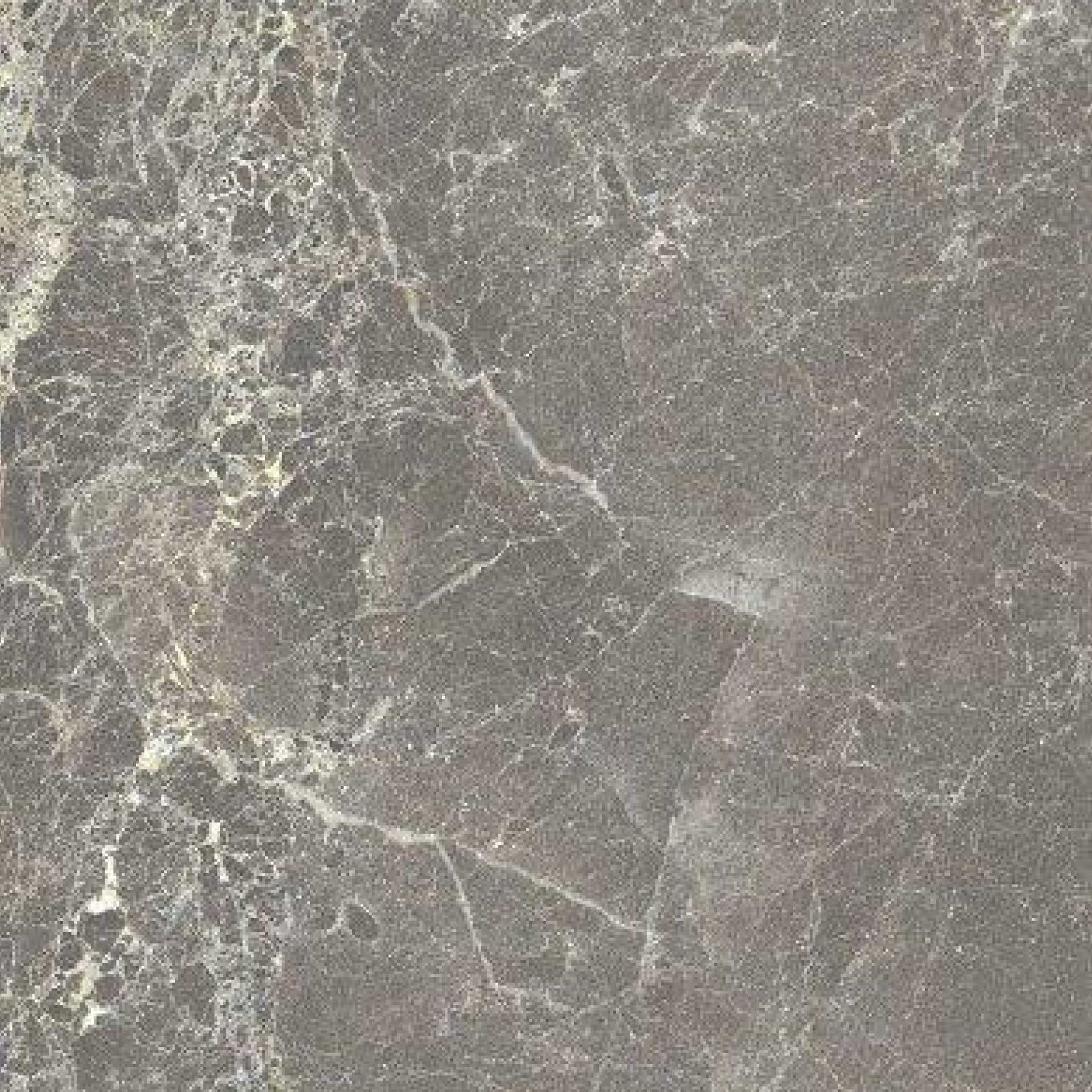 Tumma laatta, joka muistuttaa luonnonkiveä